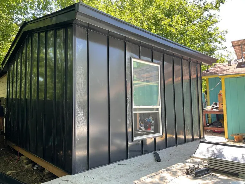 Black standing seam metal wall panels for Metal Roof Installation in Groesbeck