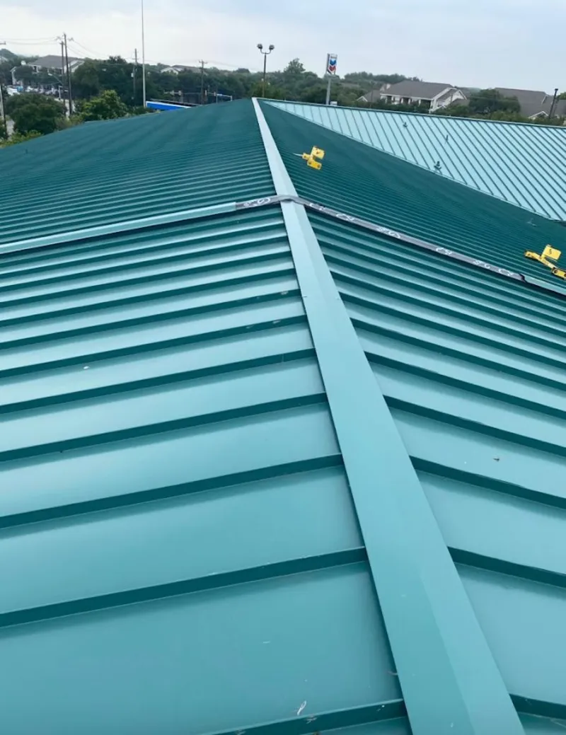Green commercial metal roof ridge and valley for Metal Roof Repair in Groesbeck
