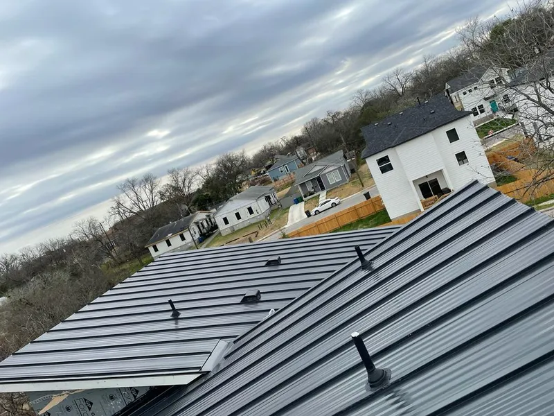 Standing seam metal roof panels with vents for Skylight Repair in Groesbeck